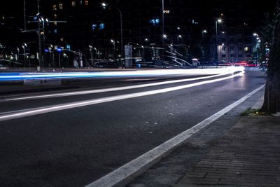 Light trails on city street at night