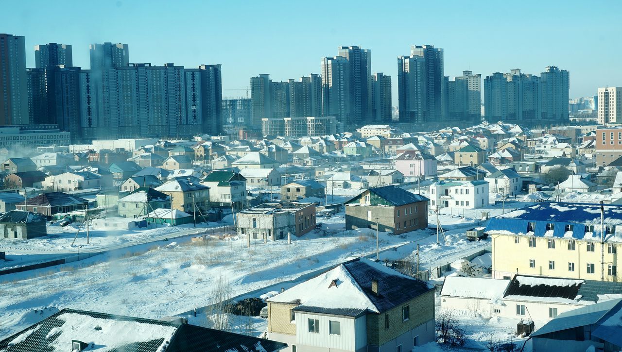 AERIAL VIEW OF CITYSCAPE DURING WINTER