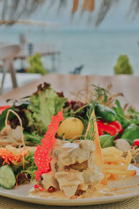 Close-up of fruits served in plate on table