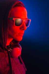 Close-up portrait of sunglasses against black background