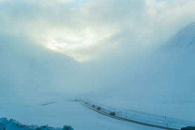 Aerial view of bridge over road against sky