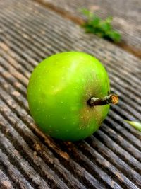 High angle view of green fruit on table