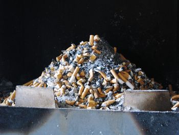 Close-up of cigarette against black background