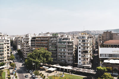 Buildings in city against sky