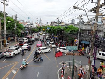 High angle view of vehicles on road in city