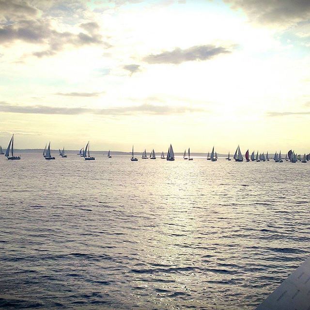 water, sea, sky, waterfront, nautical vessel, transportation, cloud - sky, tranquil scene, tranquility, scenics, rippled, mode of transport, beauty in nature, nature, boat, sunset, cloudy, cloud, horizon over water, pier