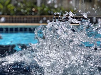 Close-up of water splashing in swimming pool