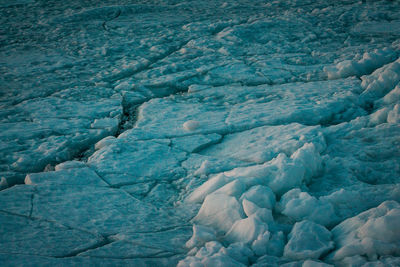 Frozen ice sheets breaking apart in petoskey michigan