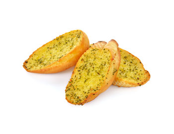 High angle view of bread against white background