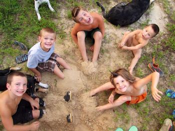 High angle view of happy friends playing