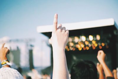 Cropped image of person holding mobile phone