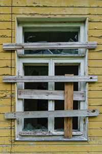 Low angle view of window of old building