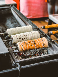 Close-up of sushi on barbecue grill