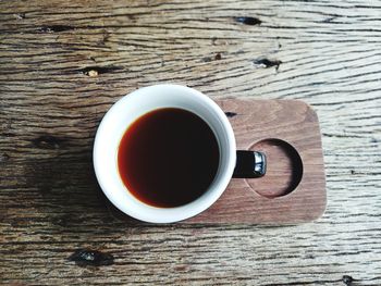 High angle view of coffee cup on table