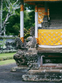 Close-up of statue against temple