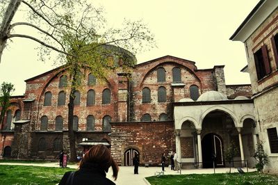 People walking on building