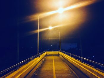 Illuminated road at night