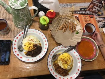 High angle view of breakfast served on table
