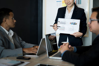 Colleagues working at office