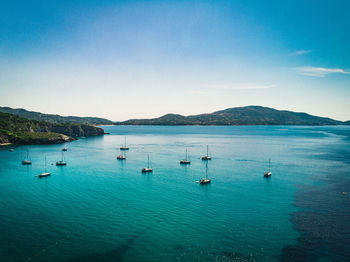 Italian bay with a few of sailing ships