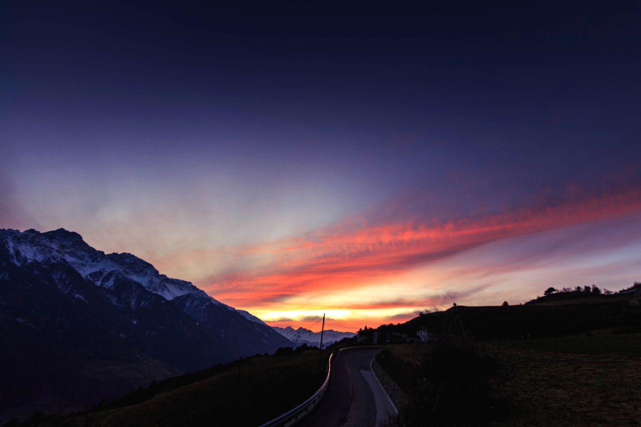 sunset, road, nature, scenics, beauty in nature, transportation, landscape, tranquil scene, sky, the way forward, tranquility, no people, outdoors, mountain, day