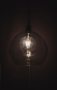 Close-up of illuminated light bulb