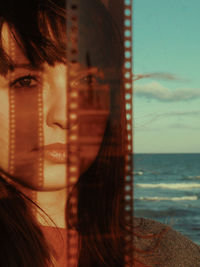 Close-up portrait of woman in sea