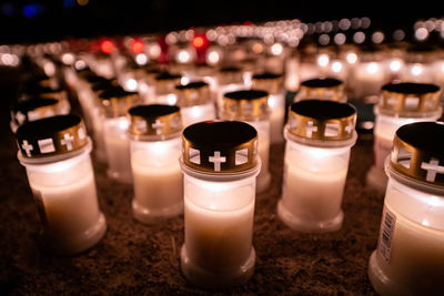 Close-up of tea light candles on table