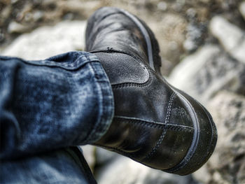 Low section of person wearing shoes