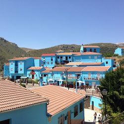 Houses against blue sky