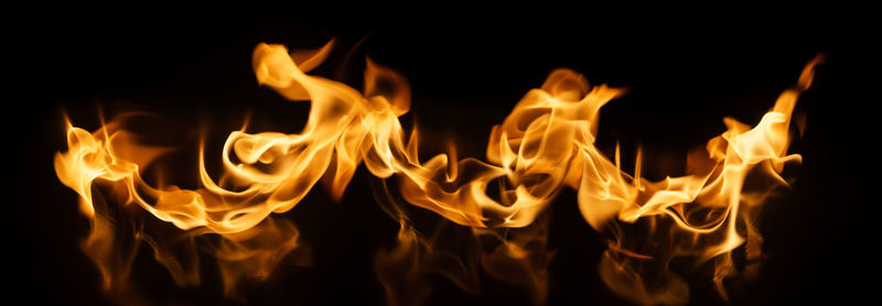 Close-up of fire against black background