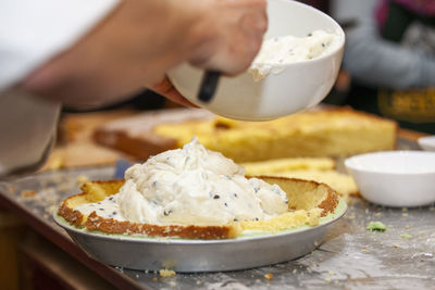 Close-up of hand holding ice cream