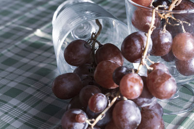 High angle view of grapes on table