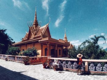 Temple outside building against sky