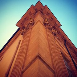 Low angle view of built structure against blue sky