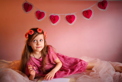 Girl writes a valentine