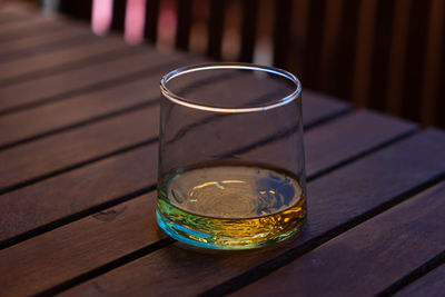 Close-up of beer glass on table