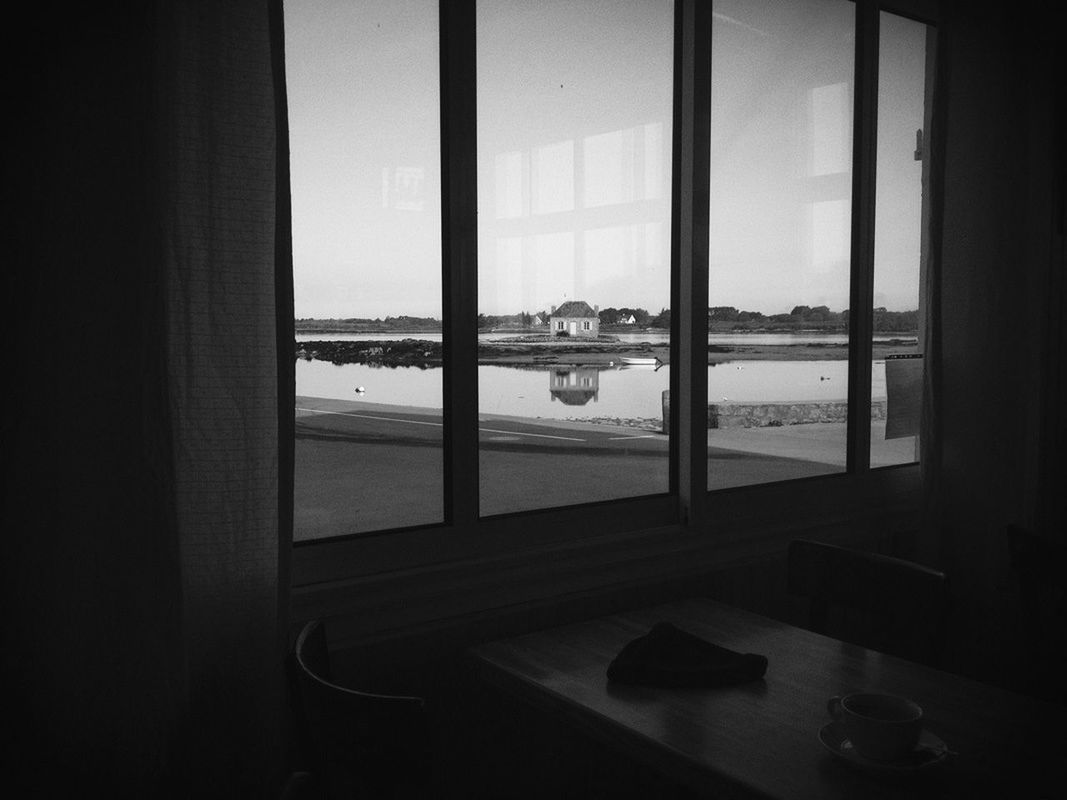 window, indoors, water, glass - material, transparent, sea, nautical vessel, mode of transport, transportation, boat, built structure, sky, architecture, looking through window, reflection, day, no people, travel, horizon over water, nature