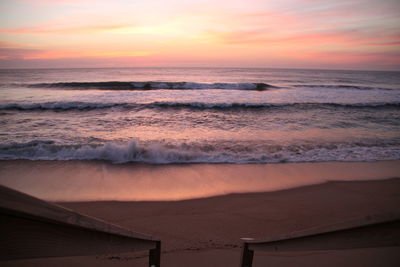 Scenic view of sea at sunset