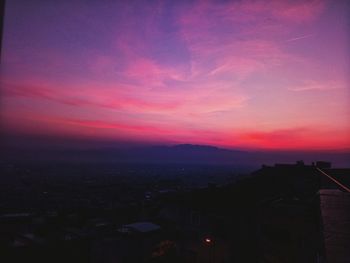 Cityscape against sky during sunset