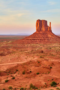 Rock formations on landscape against sky