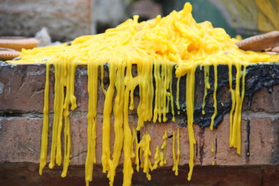 Close-up of yellow chili peppers for sale in market