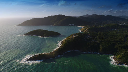 Aerial view of seashore against sky