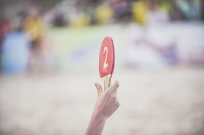 Close-up of man holding table tennis racket