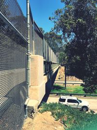 Cars on road against clear sky