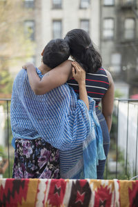 Friends embracing at a party