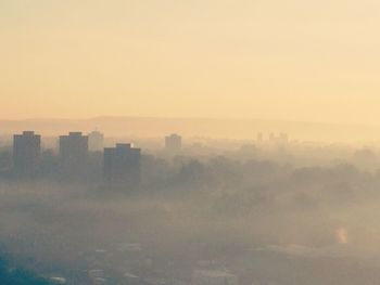 High angle view of cityscape against sky during sunset