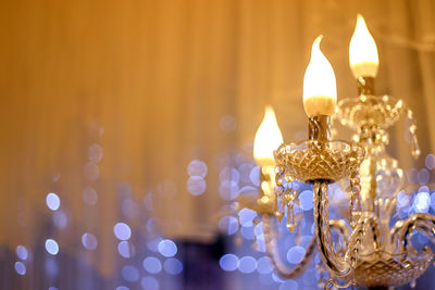 Close-up of illuminated lamp against blurred background