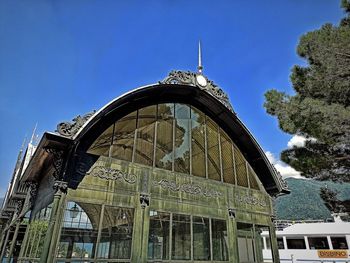 Low angle view of building against blue sky