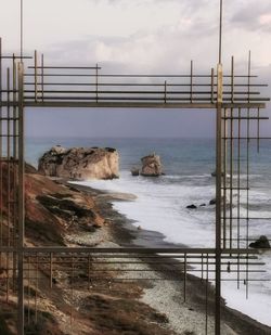 View of sea seen through railing
